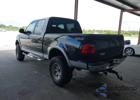 2003 Ford F-150 Lariat/Xlt z USA, uszkodzony, nr VIN 1FTRW08L13KC22754